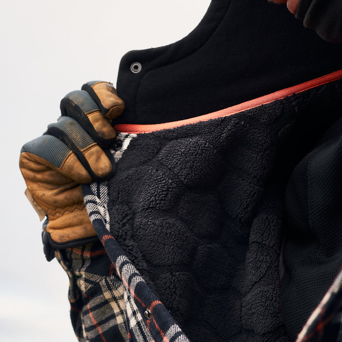 Inside insulation of the BRUNT quilted flannel work jacket in black orange plaid * 0