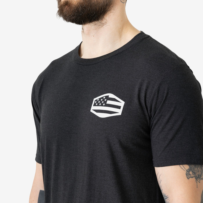 Close up of the front logo of the limited edition BRUNT high quality t-shirt in black frost