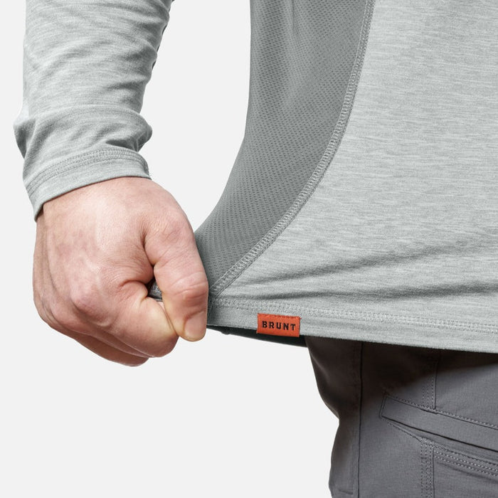 View 2 stretching hemline of the BRUNT lightweight mckenna long sleeve sun tee with UPF protection in grey heather