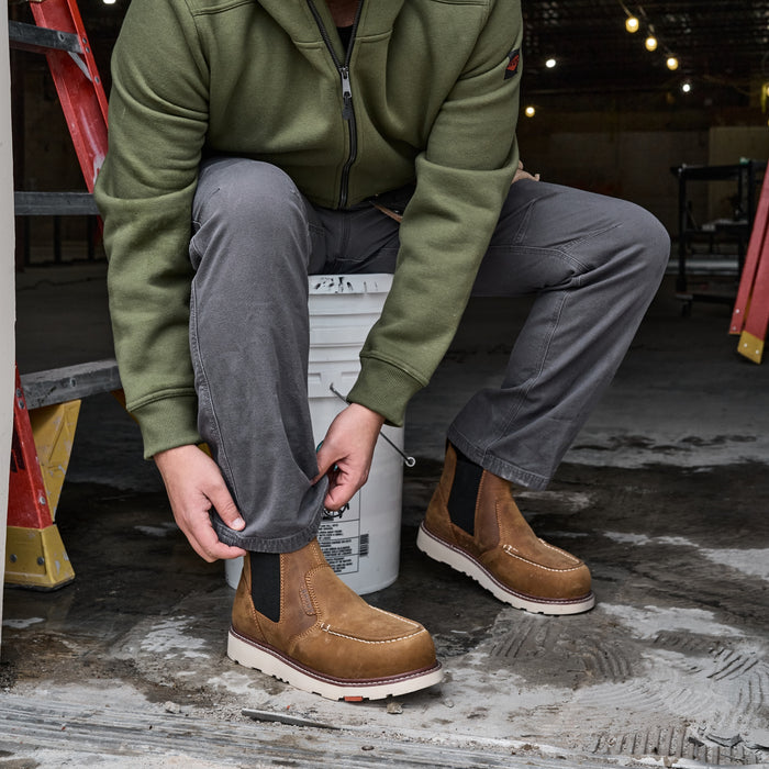 Man in BRUNT 6 inch water-resistant slip-on composite ohman moc toe work boot in brown