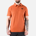View 1 front of the BRUNT lightweight breathable polo with UPF protection in BRUNT orange * 4
