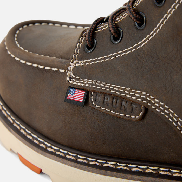 Detail shot of American flag tag and BRUNT logo tag of the BRUNT USA 6 inch waterproof welted moc toe marin work boot in dark brown