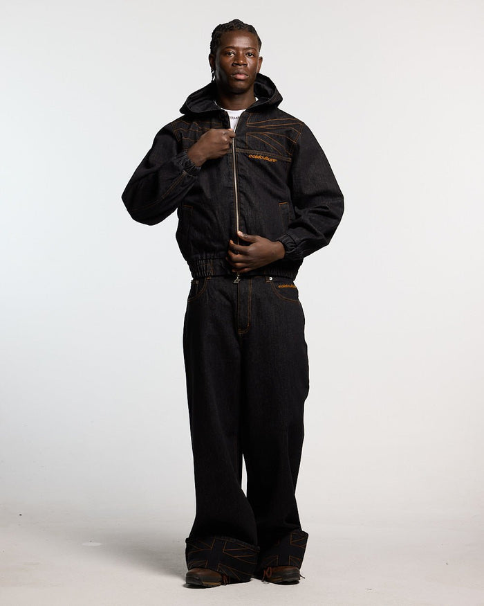 TOP BOY PANTS BLACK DENIM - black denim baggy pants, front view on male model - Cold Culture #man