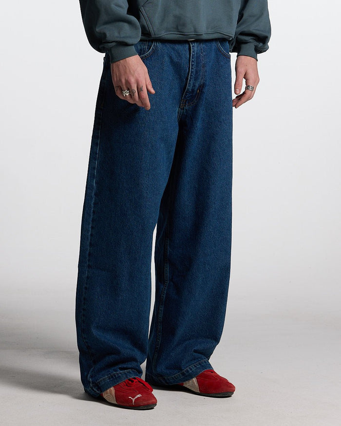 V2 PANTS BLUE DENIM - blue baggy denim pants, front view on male model - Cold Culture #man