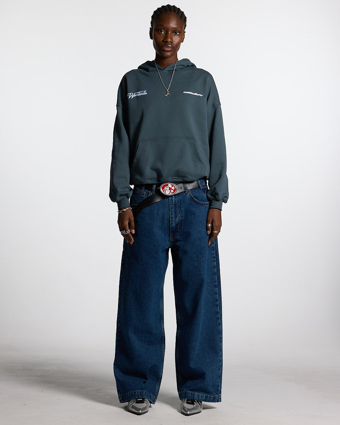 V2 PANTS BLUE DENIM - blue baggy denim pants, front view on female model - Cold Culture #woman