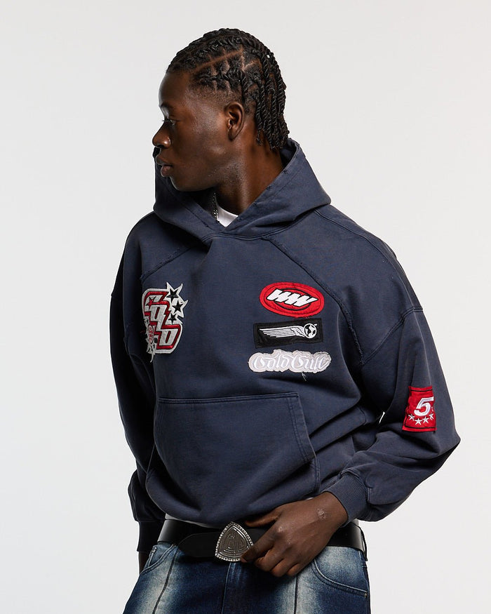 WALKER HOODIE DARK BLUE - dark blue hoodie with patches, front view on male model - Cold Culture #man