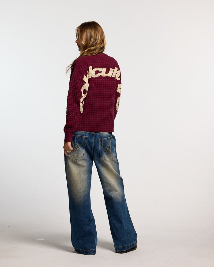 WIBBLE SCRIPT V3 PANTS BLUE - washed blue denim pants, back view on female model - Cold Culture #woman