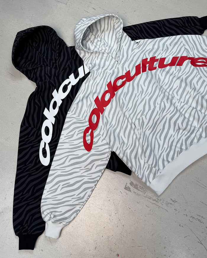 ZEBRA HOODIE WHITE - white zebra print hoodie, flat lay with matching pieces - Cold Culture